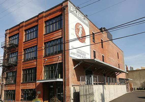 Upgrade of a 1909 brick building to office occupancy, features buckling resistant braced frames.  Design by Stack Architecture