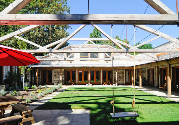 Residential cluster built in an old dairy building.  Design by Brett Schulz Architects.